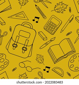 Vector seamless pattern with school supplies. A template with school attributes. School supplies. Vector illustration.