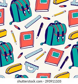 Vector seamless pattern School supplies. Green, blue, yellow and red elements on beige background. School bag, book, pencil, pen, ruler, eraser, protractor drawn in doodle style. Back to school theme.