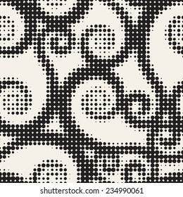 Vector seamless pattern. Scrolls in traditional halftone. Monochrome stylish background. Floral print from small dots. 