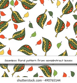 Vector seamless pattern from semiabstract leaves. Ethnic style. Fashionable colours. For fabric, cloth design, wallpaper.