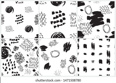Vector seamless pattern set. Abstract backgrounds with grunge brush strokes. Ink painted hand drawn textures. Black and white design.