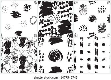 Vector seamless pattern set. Abstract backgrounds with grunge brush strokes. Black and white design. Wallpaper, print for fabric or wrapping paper.