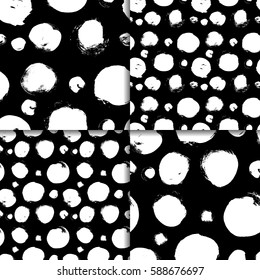 Vector seamless pattern set with circles brush strokes. Black and white doodle. Four Grunge Abstract hand drawn backgrounds with Polka dot
