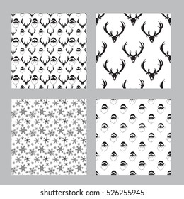 Vector seamless pattern set with deer, snowflake and Santa Claus head. Black and white patterns for fabric, paper, book cover, greeting card.