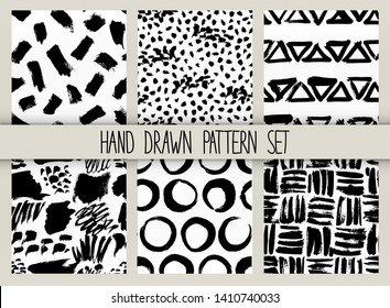 Vector seamless pattern set. Repeatable texture with black ink drawn strokes collection. Six artistic monochrome backgrounds.