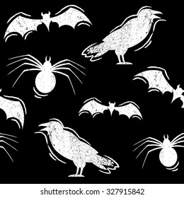 Vector seamless pattern of silhouettes bats, crows and spiders. Background for the posters, greeting cards, textile, invitations, wallpaper, web design, wrapping papers. Black and white.