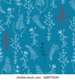 Vector seamless pattern with silhouettes of flowers and grass.