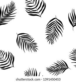 Vector seamless pattern of silhouettes palm leaves dypsis lutescens. Tropical background perfect for print, fabric, wrapping paper, wallpaper, etc