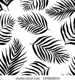 Vector seamless pattern of silhouettes palm leaves dypsis lutescens. Tropical background perfect for print, fabric, wrapping paper, wallpaper, etc