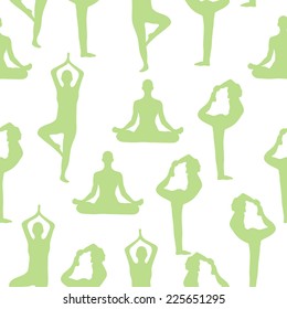 Vector seamless pattern with silhouettes of people doing yoga