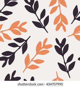 Vector seamless pattern with silhouettes of real  leaves