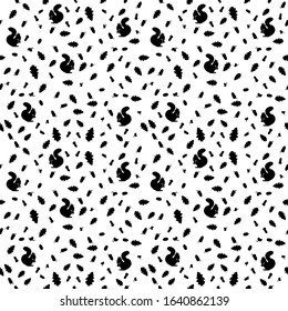 
vector seamless pattern of silhouettes of squirrels, oak leaves and acorns