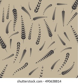 Vector seamless pattern with silhouettes of wheat ears for background