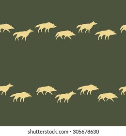 vector seamless pattern with silhouettes of yellow wolves on khaki  background