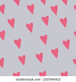 Vector seamless pattern. Simple repeating texture with chaotic hearts. Stylish hipster texture.