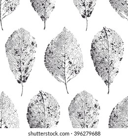 Vector seamless pattern with skeletonized leaves. Dry leaves with veins. 