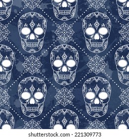 Vector seamless pattern with skulls. Grunge background with drops and splashes