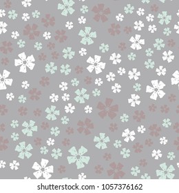 Vector seamless pattern with small delicate flowers on grey background for fabric, scrapbook