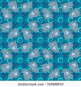Vector seamless pattern with small flowers in a gray, violet and blue colors. Rich fashionable floral texture for wallpaper, interior, tiles, print, textiles, packaging and various types of design.