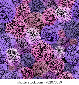 Vector seamless pattern with small furry flowers or pompoms in variety of bright colors can be used for web, print, wallpaper, spring summer fashion, fabric, textile, card background.