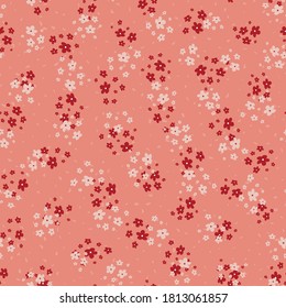 Vector seamless pattern with small scattered pink and red flowers. Elegant minimal floral background. Simple ditsy texture. Liberty style wallpapers. Repeat design for print, decor, fabric, clothing