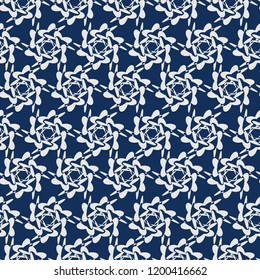 Vector seamless pattern with small twisted flowers.Modern stylish texture.Blue background