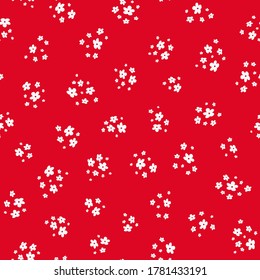 Vector seamless pattern with small white pretty flowers on red background. Liberty style wallpapers. Simple floral background. Elegant ditsy ornament. Cute repeat design for print, decoration, textile