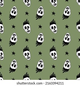 Vector seamless pattern with smiling skull and star.Rock music background.Doodle style.Design for textile,cover,poster.Isolated on green background. 