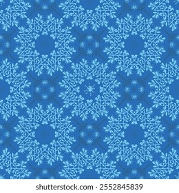 Vector seamless pattern of snowflake mandalas in various shades of icy blue. Ideal for digital backgrounds, winter-themed designs, and seasonal marketing. Light blue, navy blue, frosty white.