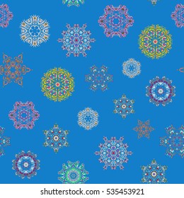 Vector seamless pattern with snowflakes, doodles and dots on blue background. Watercolor painting effect. Handmade drawing. For the Christmas design and decoration.