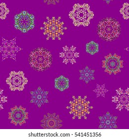 Vector seamless pattern with snowflakes, doodles and dots on violet background. Watercolor painting effect. Handmade drawing. For the Christmas design and decoration.