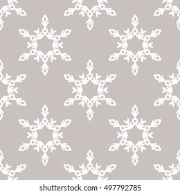 Vector seamless pattern with snowflakes. Winter background.