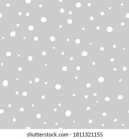 Vector seamless pattern of snowing, hand drawn abstract snow. Simple design for Christmas wrappings, textile and backgrounds