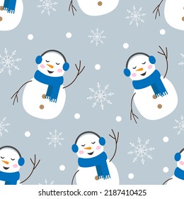 Vector seamless pattern with snowmans in blue headphones and scarfs and snowflakes