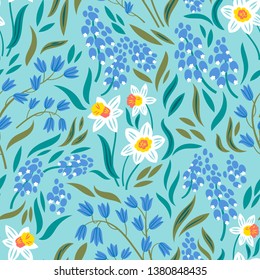 Vector seamless pattern with spring flowers: narcissuses, hyacinths and muscari
