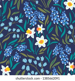 Vector seamless pattern with spring flowers: narcissuses, hyacinths and muscari
