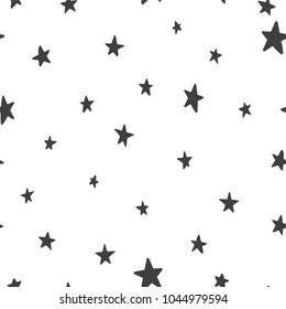 Vector seamless pattern with stars on a white background. Suitable for web backgrounds, textiles and wrapping paper.