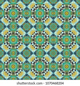 Vector seamless pattern in style of patchwork in green, brown and blue colors. Each square of the pattern is also seamless backgrounds.