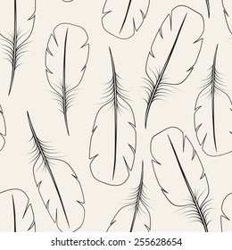 Vector seamless pattern. Stylish background with stylized plumage. Graphic texture with feathers. Monochrome graphic design