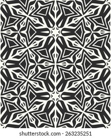 Vector seamless pattern. Stylish fabric print with ethnic tribal design.