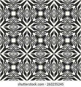 Vector seamless pattern. Stylish textile print with ethnic tribal design.