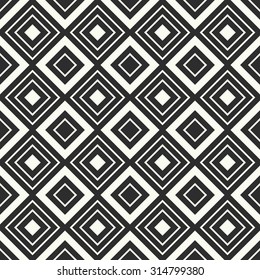 Vector seamless pattern. Stylish textile print with geometric ethnic design. Black and white fabric background.