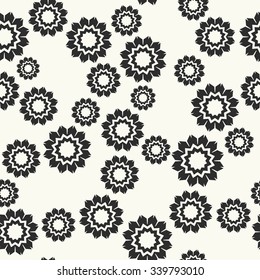 Vector seamless pattern. Stylish textile print with geometric ethnic design. Black and white fabric background with chaotic abstract flowers.