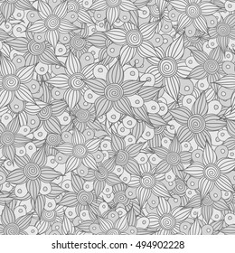Vector seamless pattern of stylized floral motif, flowers, hole, spots, doodles in gray colors. Hand drawn. Seamless floral background.