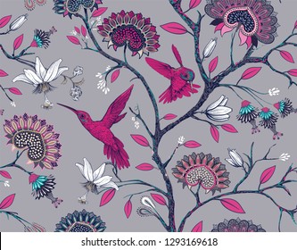 Vector sin fisuras con flores estilizadas y pájaros. Jardín de flores con colibríes y plantas. Papel pintado de flores gris y rosa. Diseño para tela, textil, papel pintado, cubierta. Vector clipart.