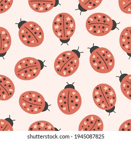 Vector seamless pattern with stylized ladybugs on the pink background. Hand drawn doodle insects.