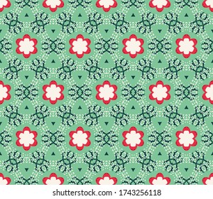 Vector seamless pattern with stylized tropical leaves and flowers