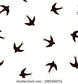 Vector seamless pattern with swallows. Simple black and white illustration with birds for wallpaper, scrapbooking, wrapping paper, textile, surface design
