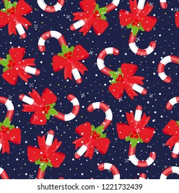 Vector seamless pattern of sweet lollipop with red ribbon and holly. Night background with snowfall. Christmas sugar cane, X-mas candy.