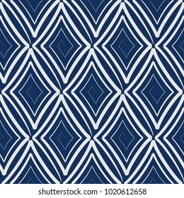 Vector seamless pattern with swirling rhombuses. Modern stylish texture.Blue background
